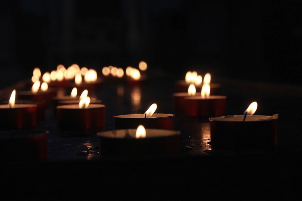 Lit prayer candles in a church